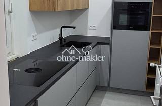 Wohnung kaufen in 40699 Erkrath, Modernisierte 2-Zimmer-Wohnung mit saniertem Balkon, Miele-Küche und Stellplatz in Erkrath-Hochdahl