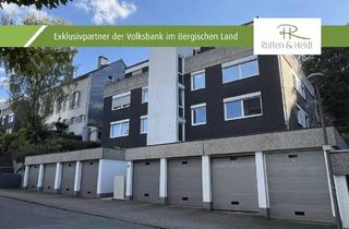 Wohnung kaufen in 42329 Wuppertal, Helle 3-Zimmer-Eigentumswohnung mit großzügigem Wohnbereich, geschützter Terrasse und Garage