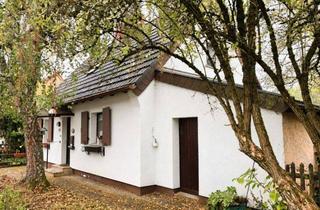 Einfamilienhaus kaufen in 66128 Saarbrücken, Willkommen zu Hause! Gemütliches Haus mit zwei Schlafzimmern und großem Garten in Gersweiler.