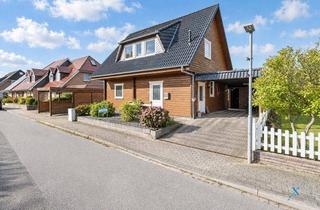 Einfamilienhaus kaufen in 24976 Handewitt, Charmantes Holzhaus mit Garten, Carport und großzügiger Werkstatt