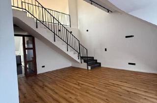 Wohnung kaufen in 41515 Grevenbroich, Grevenbroich - Moderne kernsanierte Maisonettewohnung mit 2 Loggien