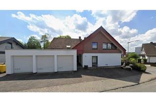 Wohnung kaufen in 57223 Kreuztal, Charmante Dachgeschosswohnung (3 ZKB) mit Loggia und Garage in Kreuztal zu verkaufen