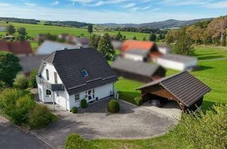 Einfamilienhaus kaufen in 36115 Hilders, Familienfreundliches Einfamilienhaus mit Südbalkon, Terrasse und Doppelcarport in Unterbernhards