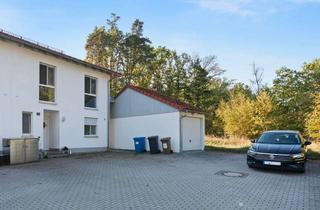 Doppelhaushälfte kaufen in 92655 Grafenwöhr, Renditestarke Doppelhaushälfte mit sicherer Vermietung und großem Eckgrundstück