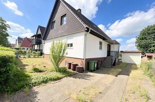 Einfamilienhaus kaufen in 64331 Weiterstadt, Einfamilienhaus mit großem Grundstück in Weiterstadt - BIETERVERFAHREN - (Sanierungsobjekt)