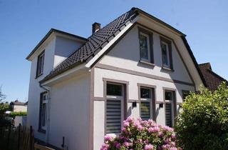 Einfamilienhaus kaufen in 26203 Wardenburg, vermietetes Einfamilienhaus in Hundsmühlen mit zwei Wohneinheiten