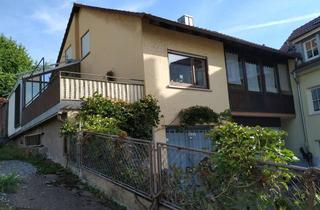 Haus kaufen in 97996 Niederstetten, Wohnhaus mit Ladenfläche und grünem Rückzugsort mitten in der Stadt