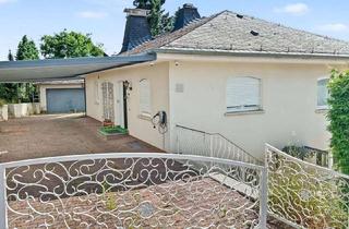 Einfamilienhaus kaufen in 61250 Usingen, Usingen: Freistehendes Einfamilienhaus mit großem Grundstück und reizvollem Naturblick in den Taunus
