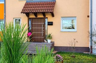 Haus kaufen in 76549 Hügelsheim, Stilvolles Familienrefugium mit Garten, Terrasse und zwei Stellplätzen