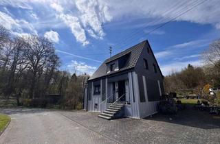 Einfamilienhaus kaufen in 57614 Borod, Wohnen im Grünen: Großzügiges Einfamilienhaus mit Wintergarten, Teichanlage und weitläufigem Garten
