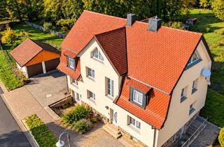 Haus kaufen in 36043 Fulda, Großzügiges Zweifamilienhaus mit ca. 241 m² Wohnfläche und direktem Zugang zur Fulda