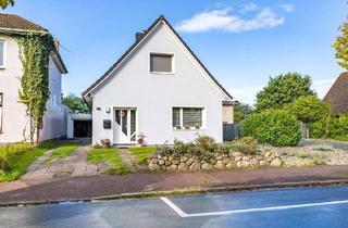 Einfamilienhaus kaufen in 25746 Heide, Modernisiertes Einfamilienhaus mit gemütlicher Wohnatmosphäre und Garten in zentraler Lage von Heide