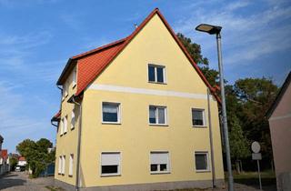 Anlageobjekt in 39240 Calbe, Voll vermietetes Dreifamilienhaus mit Garagen – Modernisierter Bestand & attraktive Mieteinnahmen