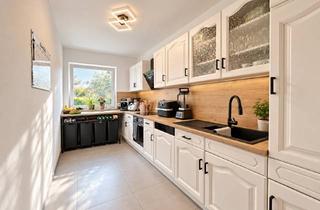 Wohnung kaufen in 53919 Weilerswist, Modernes Wohngefühl trifft auf Licht und Garten