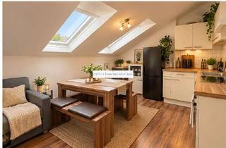 Wohnung kaufen in 75217 Birkenfeld, Vermietete 1-Zimmer-Dachgeschosswohnung mit Einbauküche und Stellplatz in Birkenfeld