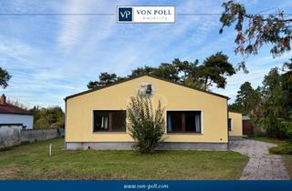 Einfamilienhaus kaufen in 15806 Zossen, Bungalow mit großzügigem Garten und Kaminofen in naturnaher Wohnlage