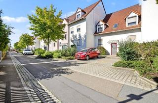 Wohnung kaufen in 91083 Baiersdorf, Gepflegte 3-Zimmer-Dachgeschosswohnung mit Balkon und TG-Stellplatz in ruhiger Lage in Baiersdorf