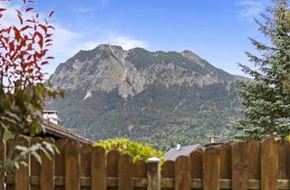 Wohnung kaufen in 87561 Oberstdorf, Ein Zuhause zum Verlieben: Exklusive Gartenwohnung mit Alpenblick im Herzen Oberstdorfs