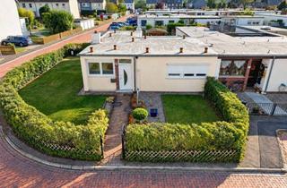 Haus kaufen in 38448 Wolfsburg, Wohnen auf einer Ebene - modernisierter Bungalow mit Wintergarten und Doppelgarage in Vorsfelde Süd