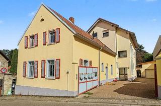 Haus kaufen in 55263 Wackernheim, Attraktives Wohnensemble – 2 Häuser mit 5 vermieteten Einheiten in Wackernheim