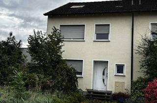 Doppelhaushälfte kaufen in 59597 Erwitte, Doppelhaushälfte in Erwitte mit Wintergarten, ausgebautem Dachgeschoss und zwei Garagen.