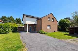 Haus kaufen in Horst-Olk-Straße 32, 33775 Versmold, Freistehendes Zweifamilienhaus mit PV-Anlage und Traumgarten zur Eigennutzung und Kapitalanlage