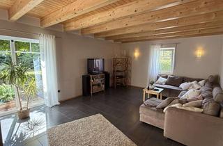 Haus kaufen in 34434 Borgentreich, Niedrigenergie-Holzhaus mit Weitblick, Südgarten & Garage in Borgentreich-Natzungen