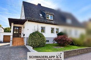 Doppelhaushälfte kaufen in 56235 Ransbach-Baumbach, Doppelhaushälfte mit großzügigem Grundstück und viel Potenzial