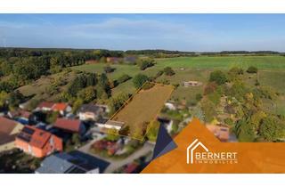 Grundstück zu kaufen in 91489 Wilhelmsdorf, Platz für Ihr Traumhaus und mehr – Baugrundstück mit Freifläche und 4 Garagen im Raum Nürnberg