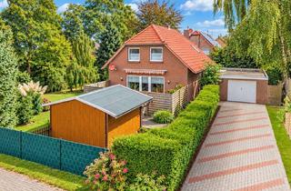 Einfamilienhaus kaufen in 26524 Hage, Gepflegtes Einfamilienhaus mit zwei Garagen in ruhiger Siedlungslage von Hage