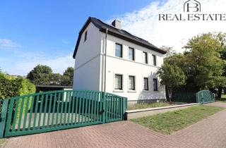 Haus kaufen in 39345 Neuenhofe, Charmantes Zweifamilienhaus mit vermieteter Einliegerwohnung