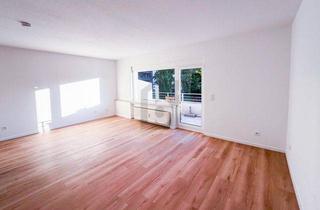 Wohnung kaufen in 41564 Kaarst, MODERNISIERTER ALTBAUMCHARME IN TOP LAGE