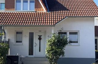 Doppelhaushälfte kaufen in 55239 Gau-Odernheim, Modernisierte Doppelhaushälfte mit Wärmepumpe, PV-Anlage, Garten und Einliegerwohnung