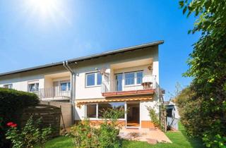 Haus kaufen in 65830 Kriftel, Viel Raum für Familien – großzügiges Reihenendhaus mit Garten und Garage