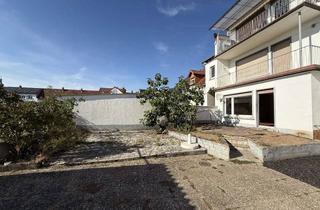 Wohnung kaufen in 68766 Hockenheim, Gepflegte 2-Zimmer-Wohnung im EG mit Terrasse und Gartenanteil