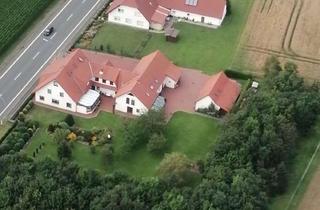 Mehrfamilienhaus kaufen in Bremer Straße 76, 32339 Espelkamp, Einladendes Mehrfamilienhaus mit großem Garten