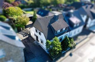 Einfamilienhaus kaufen in 52223 Stolberg, Einfamilienhaus in Stolberg/Breinig mit Baugrundstück