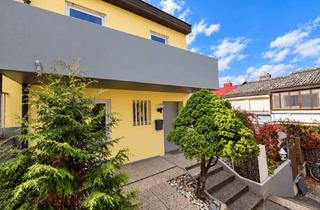 Doppelhaushälfte kaufen in 94032 Innstadt, Charmante Split-Level-Doppelhaushälfte mit Kamin, Garten & Garage in Passau-Innstadt