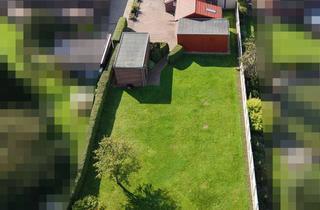 Haus kaufen in 26434 Wangerland, Hier steckt mehr drin! Ein Zuhause voller Möglichkeiten mit großem Garten mitten in Hooksiel!