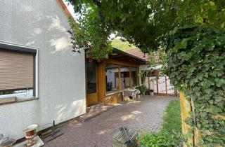 Doppelhaushälfte kaufen in Kleeweg 11, 39128 Nordwest, Verkauf einer Doppelhaushälfte mit Kamin und Wintergarten.