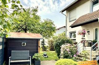 Wohnung kaufen in 64331 Weiterstadt, 5-6 Zimmer-Eigentumswohnung im Reihenendhausstil mit Garten und Garage
