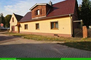 Einfamilienhaus kaufen in 06369 Trebbichau, Charaktervolles Landhaus mit Innenhof, Scheune und Werkstattgebäude