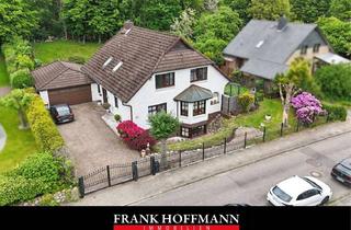 Einfamilienhaus kaufen in 25451 Quickborn, Attraktives Einfamilienhaus mit großzügiger Wohnfläche in begehrter Waldrandlage in Quickborn