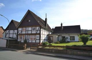 Haus kaufen in Hauptstraße 22, 37649 Heinsen, Einfamilien-Fachwerkhaus mit Nebengebäude inkl. 2 Garagen und großem Grundstück