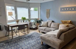 Wohnung kaufen in 71272 Renningen, Stilvolle, modernisierte 3-Zimmer-Terrassenwohnung mit kleinem Garten und Einbauküche in Renningen