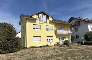 Haus kaufen in 79739 Schwörstadt, Wohnhaus mit großem Grundstück, drei Wohnungen, Garage und Stellplätzen