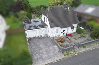 Einfamilienhaus kaufen in 31863 Coppenbrügge, Einfamilienhaus am Feldrand mit Doppelgarage & großem Garten