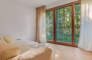 Wohnung kaufen in 15741 Bestensee, Naturnaher Luxus – stilvolle Terrassenwohnung mit großzügigem Privatgarten