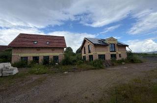 Haus kaufen in Nordholz 5-7, 31167 Bockenem, Investmentchance: Vier Grundstücke mit zwei Häusern