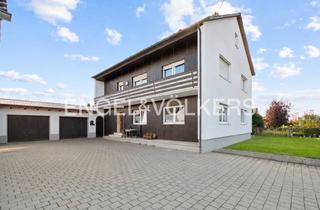 Haus kaufen in 86647 Buttenwiesen, Attraktives Zweifamilienhaus mit zwei Wohneinheiten, Balkon und Garagen